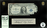 USA, $1 silver certificate, series 1935E, serial X73863705H, Priest-Humphrey, PCGS Currency Grade B, with display box, COA, and DVD.