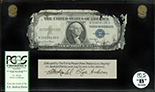 USA, $1 silver certificate, series 1935D, serial H10858130G, Clark-Snyder, PCGS Currency Grade B, with display box, COA, and DVD.
